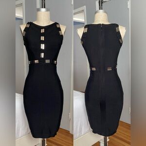Womens black stretch bodycon dress w/gold details. In size S but fits like XS.